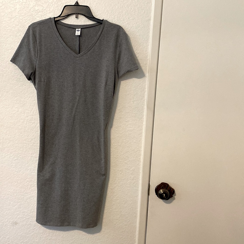 Charcoal grey t shirt dress. Form fitting.